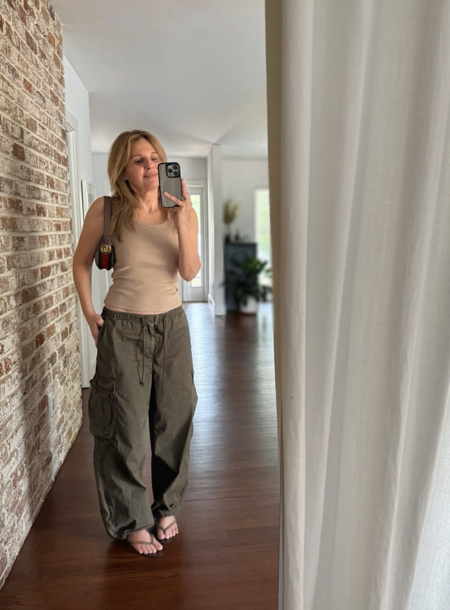 Cargo Pants are from @Aritzia in exact match below, wearing size: S. Bag from Gucci, similar styles for my tank and studded sandals.

#LTKootd #LTKSeasonal #LTKSaleAlert