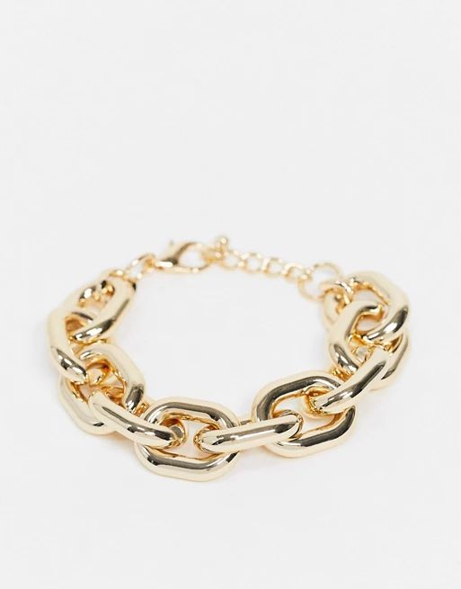 ASOS DESIGN bracelet in statement hardware chain in gold tone | ASOS (Global)