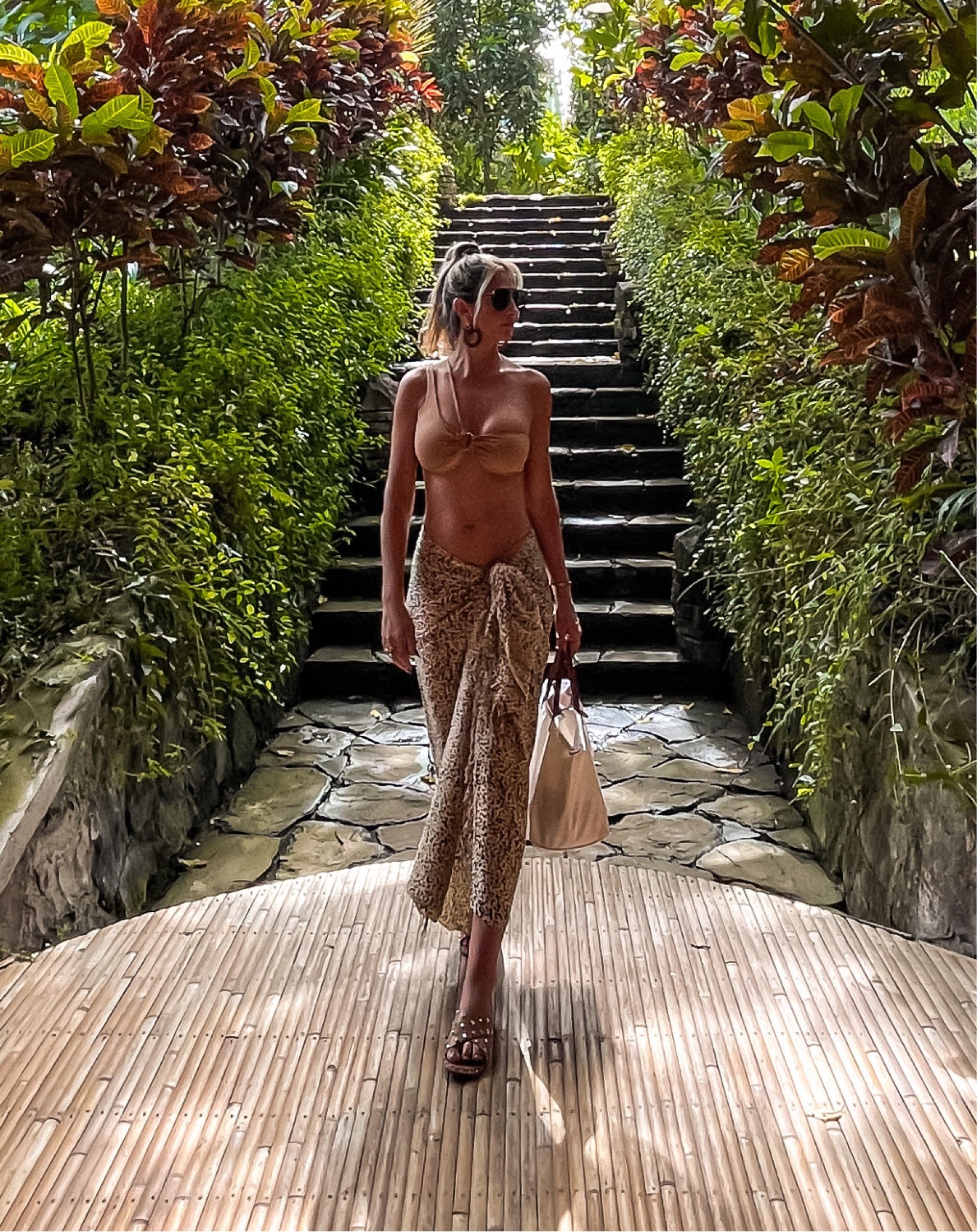 Summer look. Beach outfit. Beige bikni top. Sunglasses. Beach chic Leopard print beach wrap. Leopard print maxi skirt. White shoulder bag. Tan shoes. Longchamp. Bikini look Beachwear #vacation look. Monochromatic. #monochromatic #bikini #bikinilook #beachfashion #fashioninspiration #stylingideas

#LTKfit #LTKstyletip