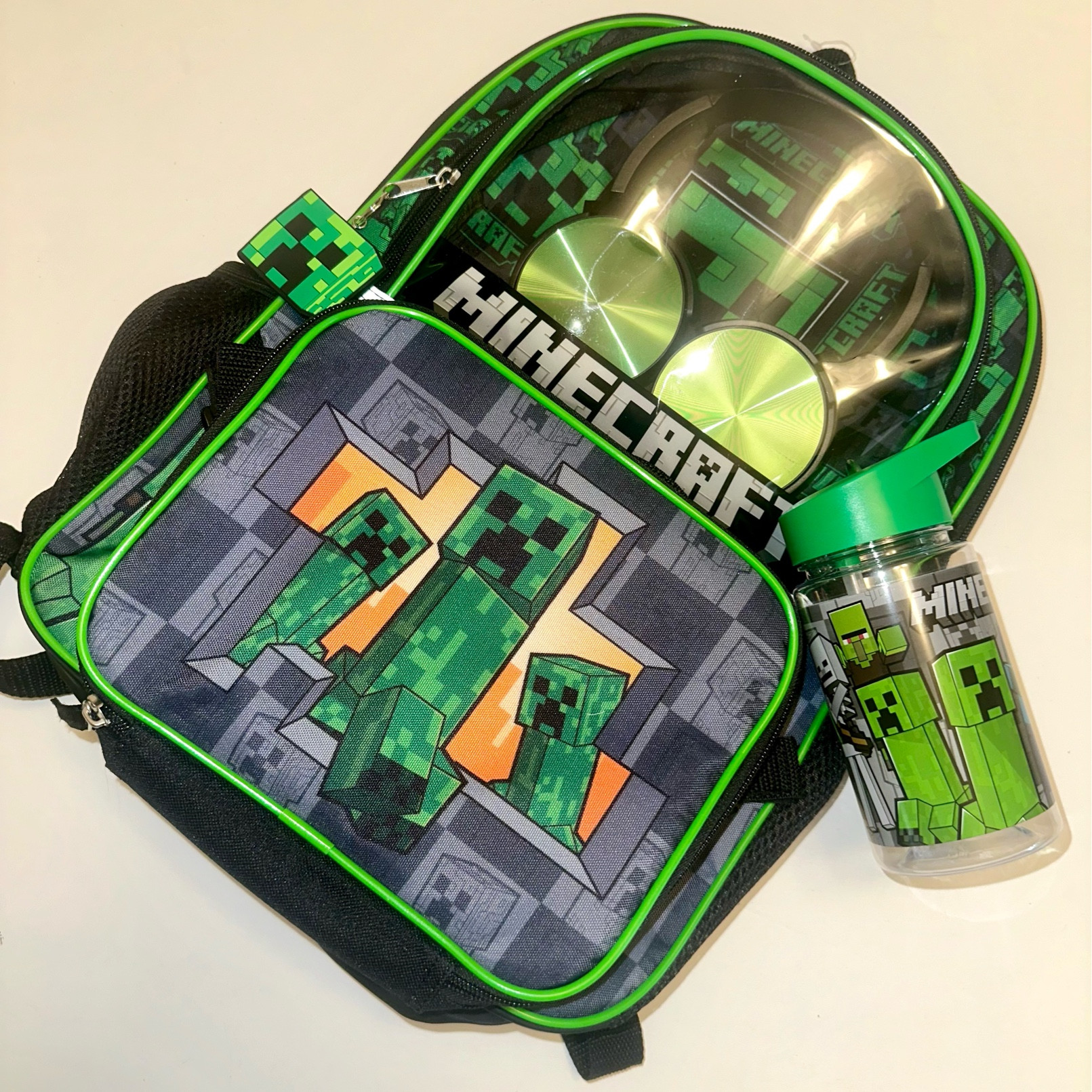Back to school Backpack ideas, all in one!

• Creeper print insulated lunch bag
• Green water bottle
• Headphones for easy listening
Target 🎯 

#LTKKids #LTKBacktoSchool #LTKFindsUnder50