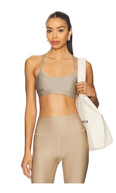 alo Airlift Intrigue Sports Bra in Gravel from Revolve.com | Revolve Clothing (Global)