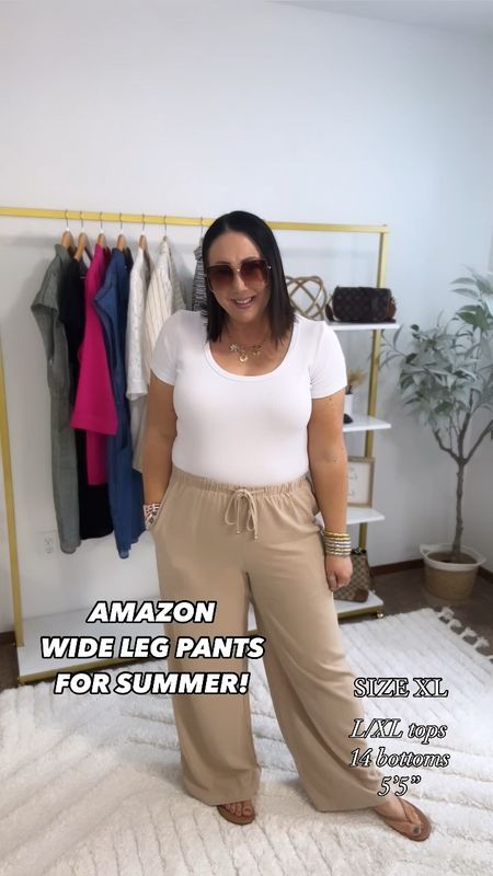 I found the perfect lightweight pants for summer!  Excuse me while I order more colors!  Wearing an xl in mine for a perfect fit. XL white tee. Xxl black tee. Sandals and flip flops run tts  

#LTKMidsize #LTKOver40 #LTKSeasonal