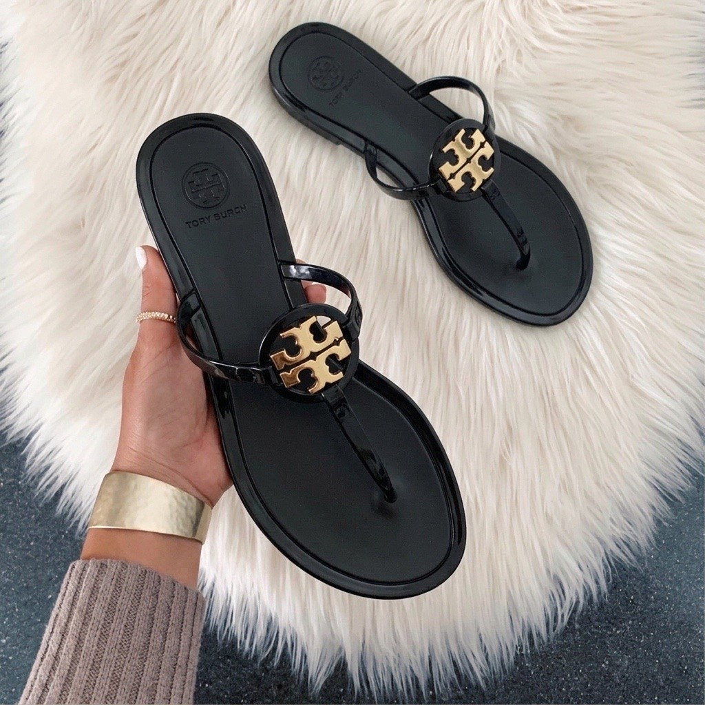 Tory Burch Mini Miller Jelly Thong Sandal only come in whole sizes so go up a half size if your in between sizes like I am