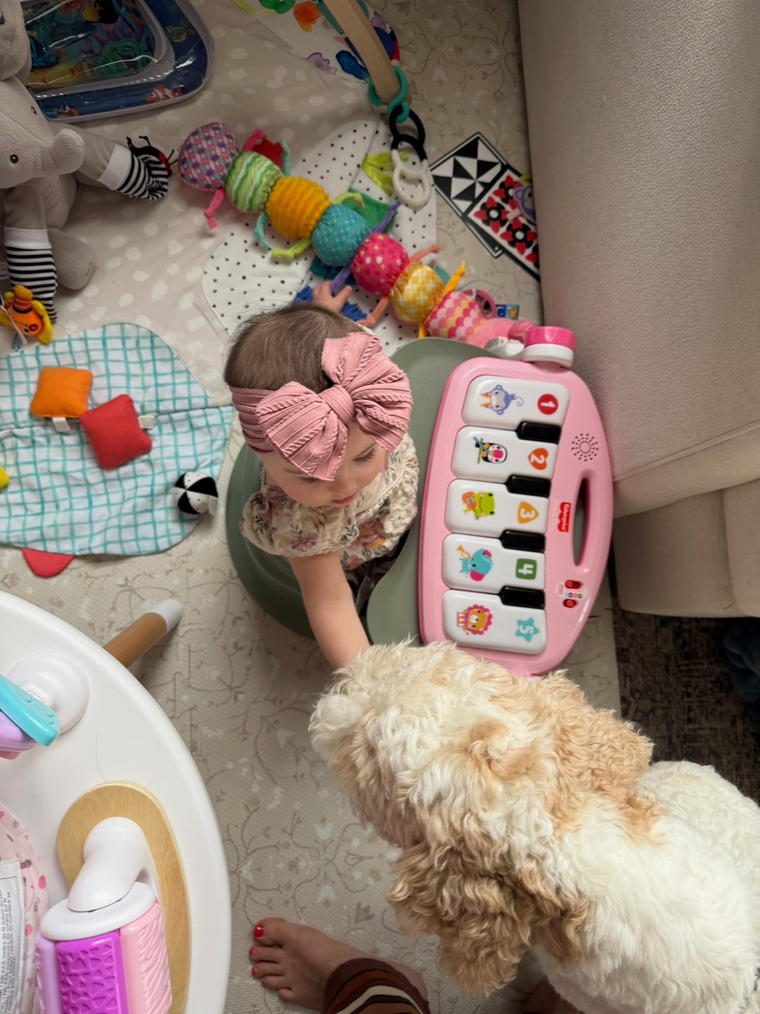 Linking our most asked about baby girl finds from Amazon! Our play mat and table that keep her busy, her seat and most worn bows!