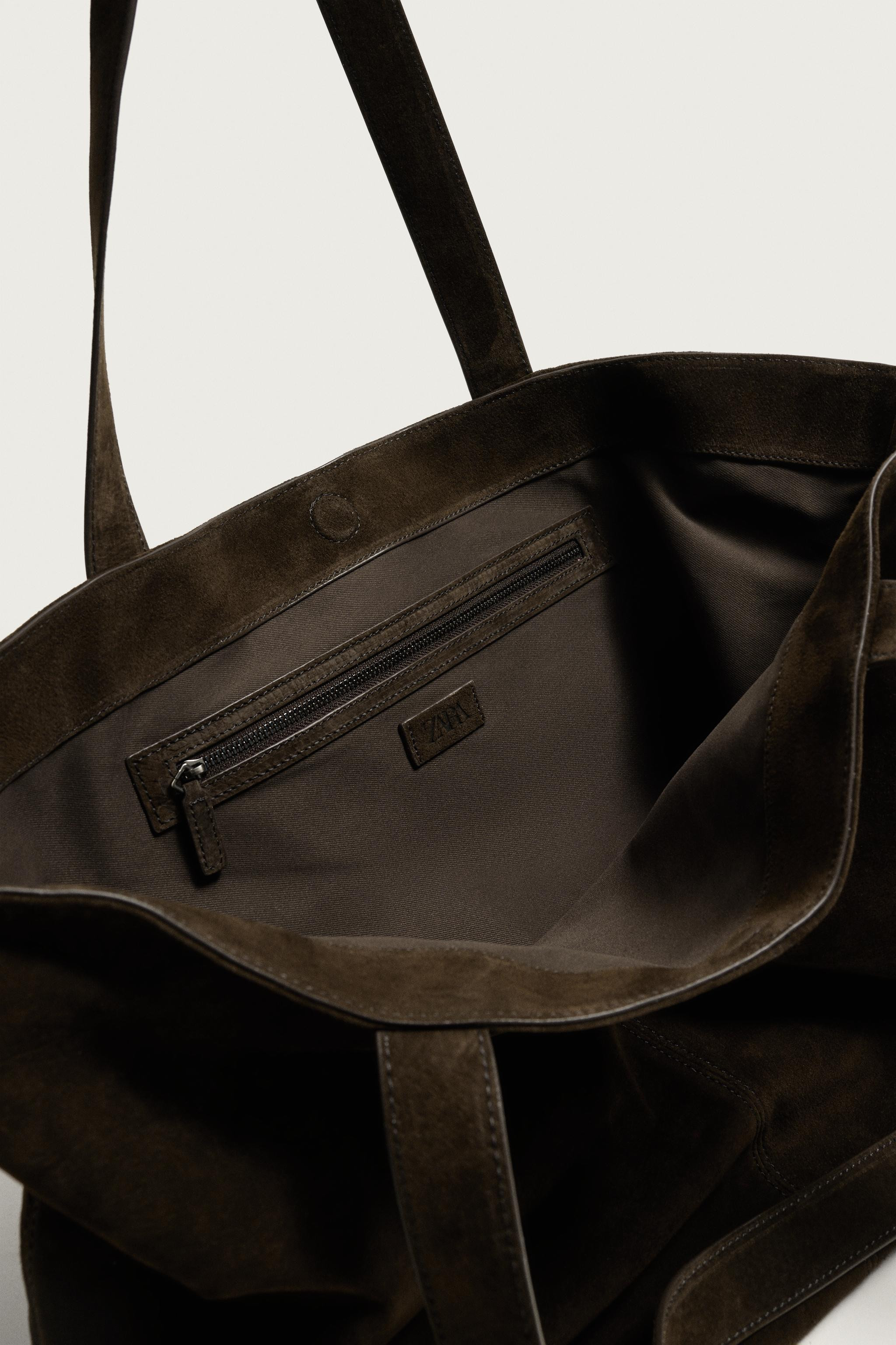 Model height: 185 cmTote bag crafted in split suede leather. Main compartment with magnetic faste... | Zara UK