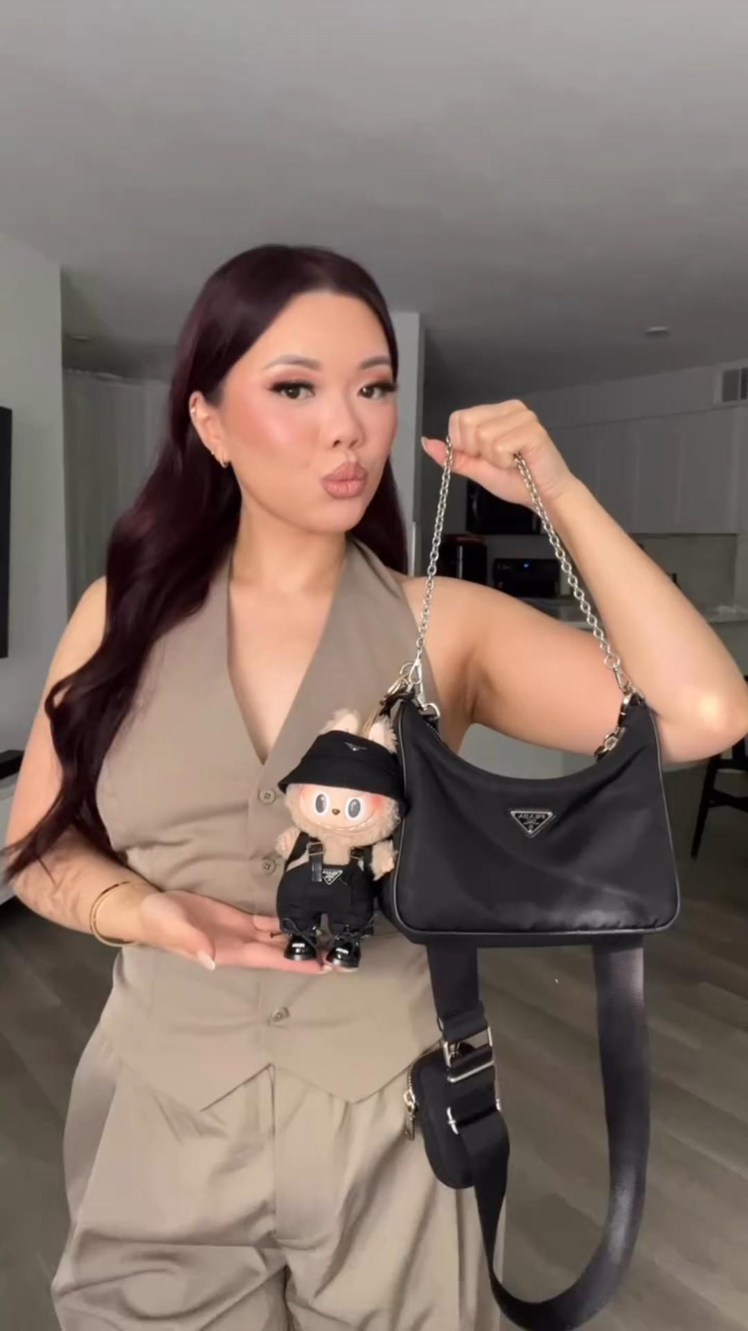 Matching outfits with my labubus 🖤 link in bio to my LTK for outfit details 

@popmart_us @popmart 
@oakandfort 
@prada
@newbalance 

#labubu #popmart #oakandfort #outfit #prada #bagcharm