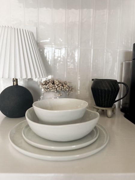 favorite dinnerware - looks so much more high end/designer at an affordable price. love the low profile/lip + organic edge + style. perfect for everyday but also dress up for Easter, spring + summer hosting, & more. have had for a couple years and love this set. just got the pasta/salad bowls & an extra set for hosting. 

Crate & barrel. Dinnerware. White dinnerware. Plates. Bowls. Easter tablescape. Easter hosting. Spring tablescape. Spring decor  

#LTKfindsunder50 #LTKsalealert #LTKhome