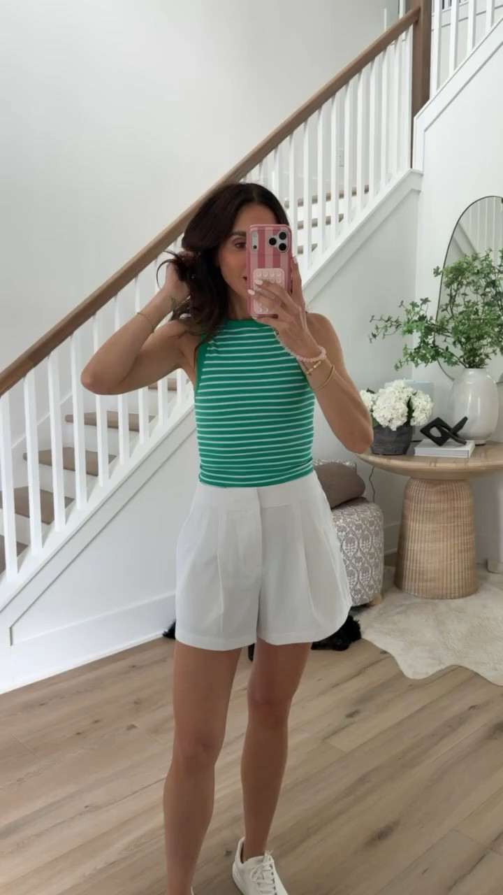 This outfit is such a fresh take on classic summer style. The green striped tank paired with crisp white shorts feels polished, sporty, and effortless for everything from vacation days to weekend errands. One of those easy outfits that always looks put together.

XS in top, S in shorts, discount code for shoes: BRSTYLE15

Green striped tank, White shorts outfit, Summer outfit ideas, Casual summer style, Vacation outfit, Preppy summer fashion, Everyday outfit inspiration, Weekend style, Summer basics, Comfortable summer outfit, Resort wear, Cute casual outfit, Annabrstyle

#LTKootd #LTKSeasonal #LTKActive