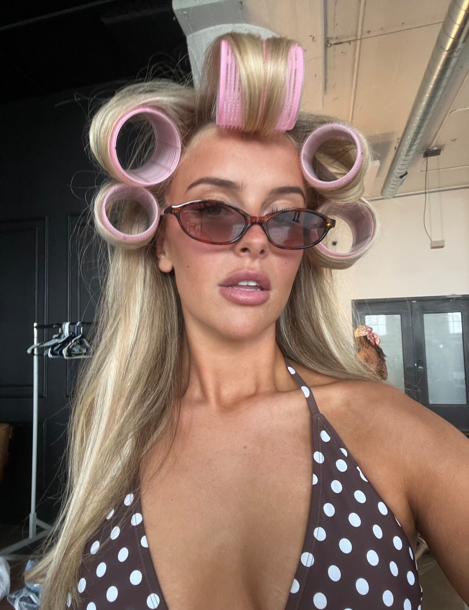 channeling my inner retro babe 💋 hot pink rollers, vintage sunnies & a bikini moment that’s giving main character ☀️🍒 

#LTKSeasonal #LTKSwim