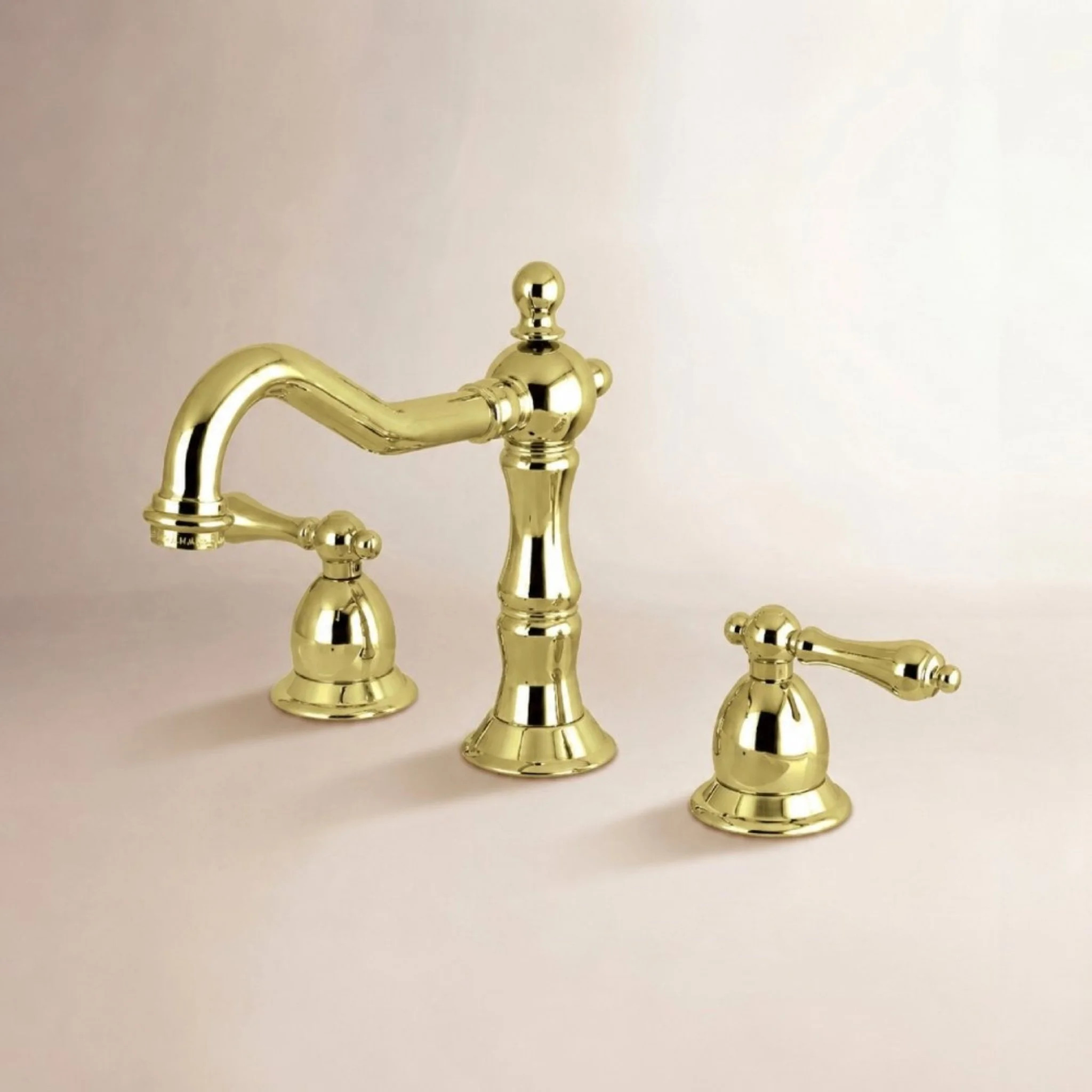 Kingston Brass Heritage Two-Handle 3-Hole Deck Mount Widespread Bathroom Faucet with Brass Pop-Up Drain | Birch Lane