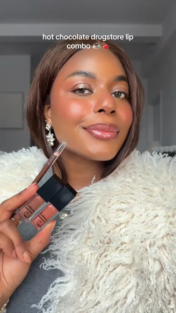 Cozy and shimmery hot chocolate lip combo using drugstore beauty products! Love this warm spice lip for the winter. Using elf cosmetics lip liner and glosses to achieve this warm brown makeup! Lining the products used below! … For more links to stocking stuffers, makeup bag, snow boots, holiday party dress finds, follow me on LTK! ✨

#LTKHoliday #LTKgrwm #LTKBeauty
