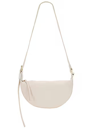 ALLSAINTS Half Moon Crossbody in White from Revolve.com | Revolve Clothing (Global)