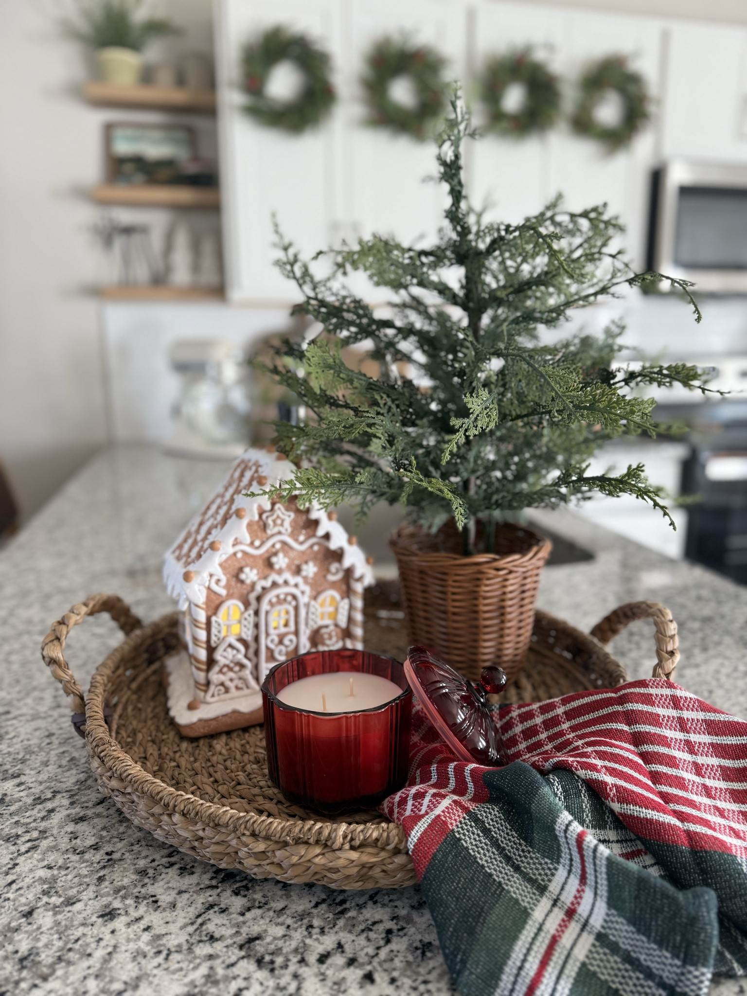 Christmas centerpiece, gingerbread house, light up mini Christmas tree, woven tray, home decor

#LTKHoliday #LTKHome #LTKSeasonal