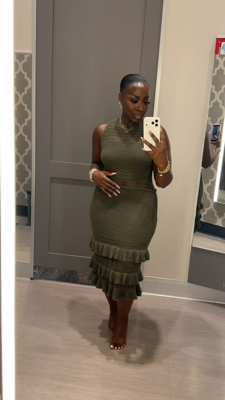 Love this olive green, knit dress! Wearing a size small and it has a good amount of stretch.