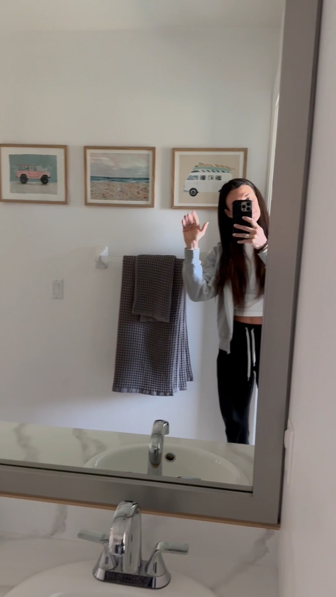 Before, during and after our kids bathroom update! The only thing we took out and changed professionally was the tile in shower and floors and had our existing tub re finished! The rest was DIY and kept what was existing making this a SUPER affordable update. I used Retique wood paint on the cabinets to give it a wood look, painted the walls and trim bright white (BM - Chantilly Lace), did an epoxy kit on the counter to give it a marble look, updated faucets, and added a mirror frame! It will be perfect for our littles for quite some time :) 

#LTKFamily #LTKWatchNow #LTKHome