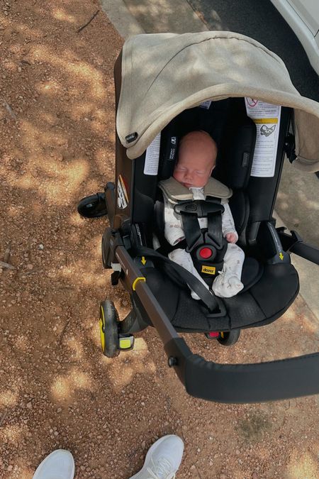 doona stroller is perfect for travel & running errands. a car seat and stroller in one! // we also got the mockingbird for regular walks + the nuna car seat and attachment for it to fit the mockingbird stroller  