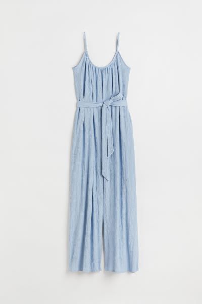 Relaxed-fit, sleeveless jumpsuit in crinkled jersey. Narrow, adjustable shoulder straps, wide nec... | H&M (US + CA)