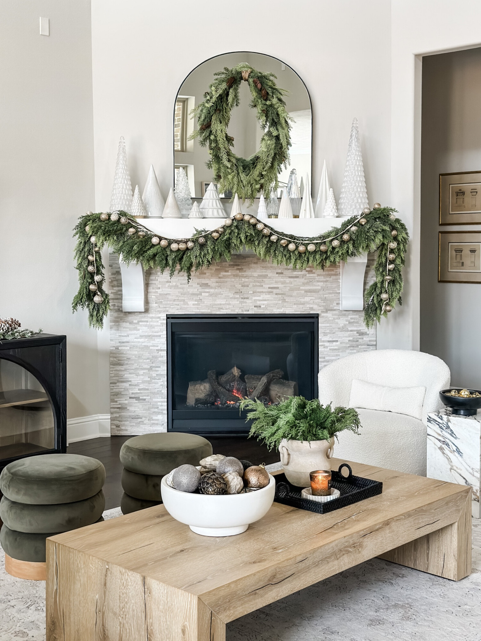 Holiday mantle styling
living room  holiday decor  holiday living room  Christmas decor  seasonal decor  Christmas living room inspo  chic Christmas decor  Christmas  garland  wreath  coffee table styling

#LTKHoliday #LTKHome #LTKSeasonal