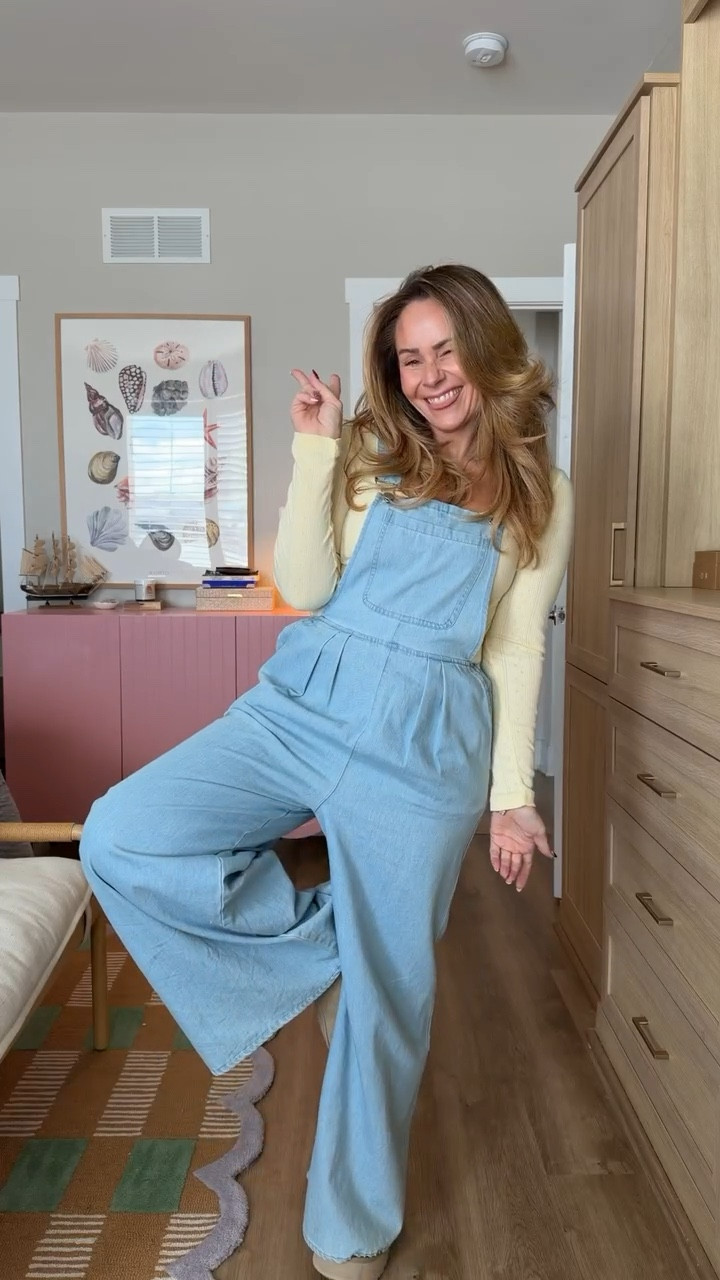 Soft launch of spring but make it comfy ☀️💛

This chambray wide-leg jumpsuit is the kind of piece that does all the work for you — flowy, flattering, and petite-friendly with the best drape. I layered it over a fitted long sleeve for now, but it’ll be so good with a tank when it warms up.

Easy. Effortless. “Where’d you get that?” energy.

Linked everything here 

chambray jumpsuit, wide leg jumpsuit, denim overalls, denim romper, petite friendly jumpsuit, spring transition outfit, layered spring look, casual chic outfit, everyday mom outfit, effortless style, comfy but put together, coastal casual, soft neutral outfit, elevated basics, wide leg pants outfit, soft launch of spring, cozy meets chic, minimalist layering, capsule wardrobe piece, versatile one piece, weekend outfit idea, school drop off outfit, coffee run outfit
