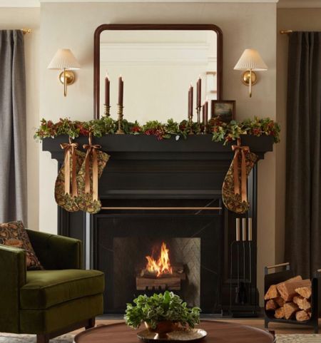 It’s the season of the year to cozy up by the fireplace, The large mirror here makes the mantle area expansive while the brass wall sconces with the pleated tapered shades elevate the space with a touch of sophistication and classic. A comfy lounge chair and a wood coffee table define the space with style. And of course, what could be better to deck the hall with Al the holiday stocking and greenery. 

#LTKHoliday #LTKVideo #LTKGiftGuide
