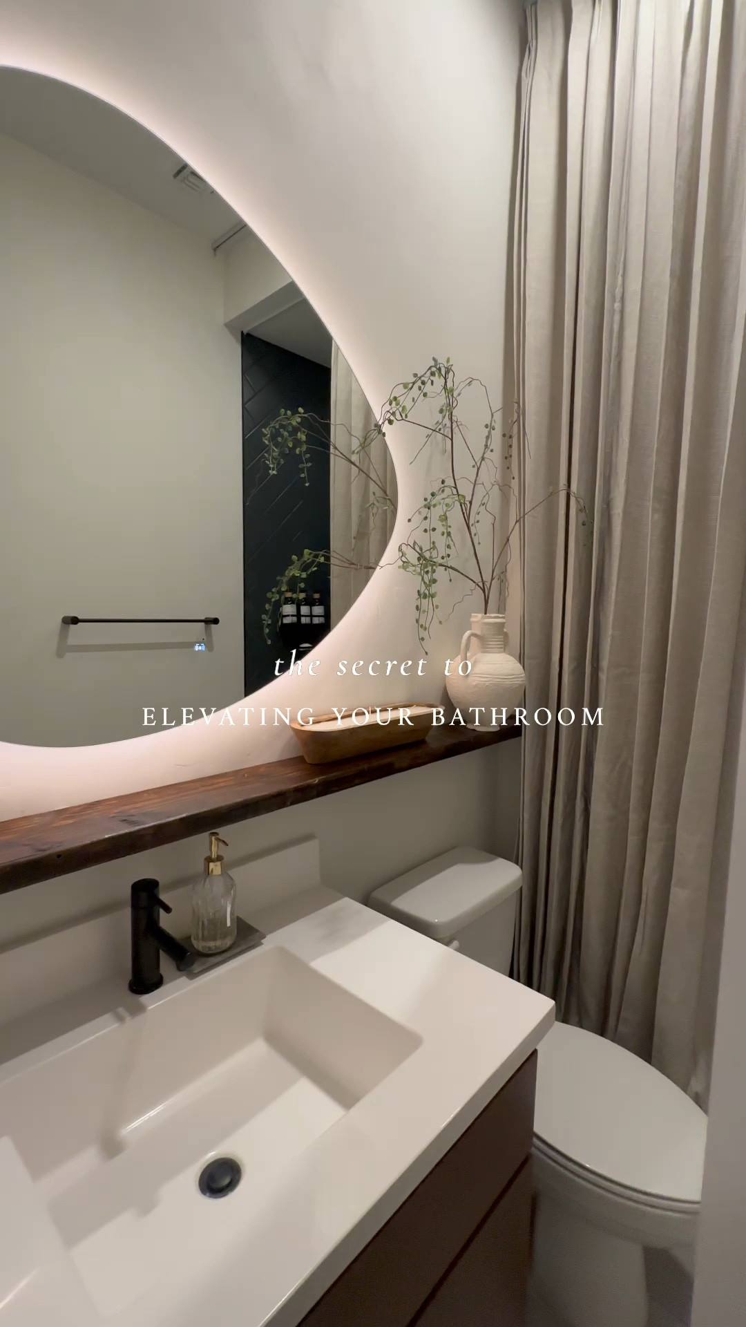 The easiest way to elevate your bathroom. Use ceiling tracks and have floor to ceiling curtains 🤎