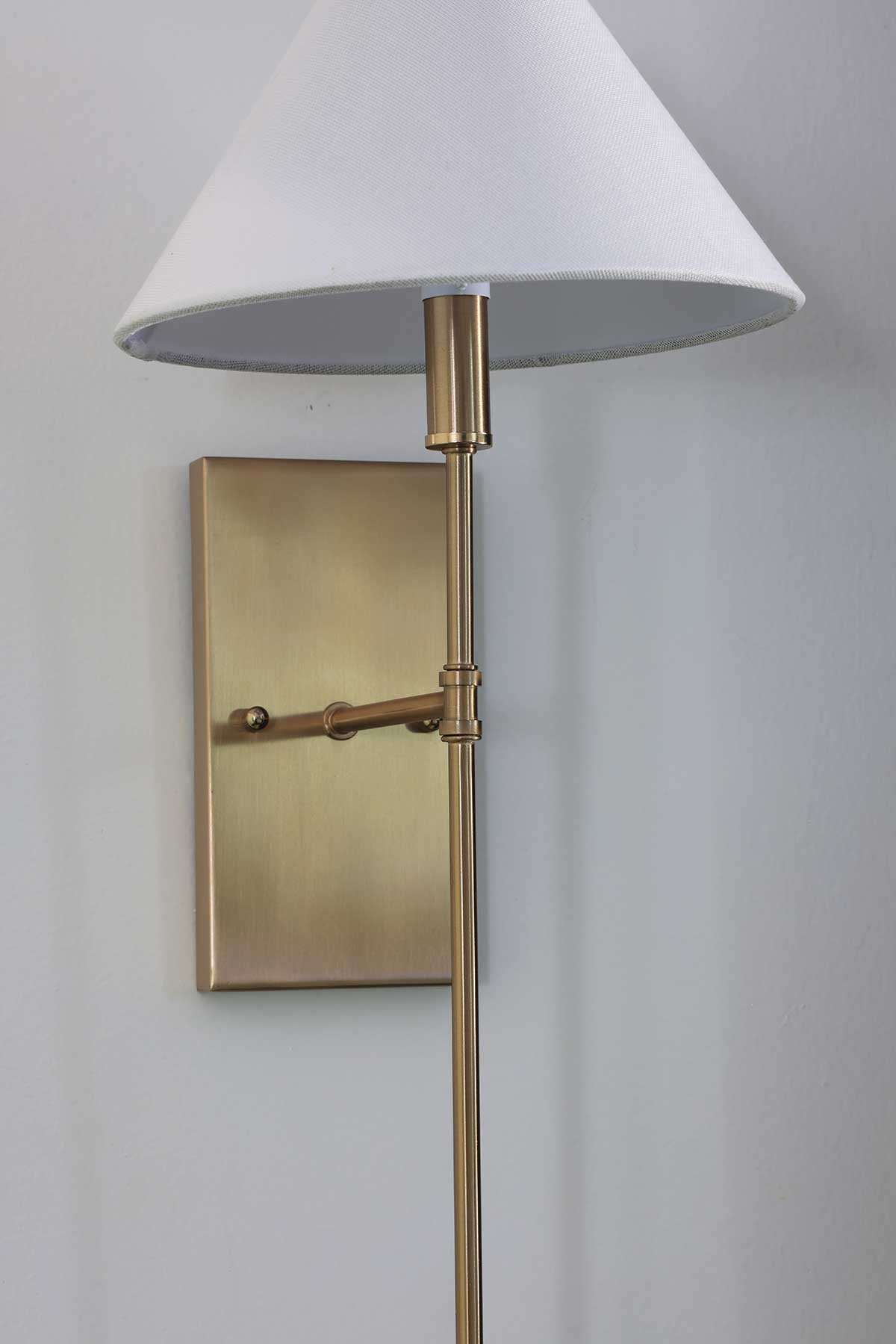 A brass wall sconce with an empire shade is a classy touch to light up any wall.   

 #LTKHome