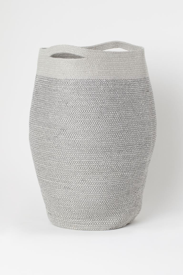 Jute laundry basket with two handles. Diameter approx. 13 3/4 in., height 25 1/2 in.
	Composition... | H&M (US + CA)