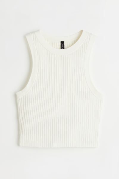 Short sweater vest in a rib-knit viscose blend. Round neckline, narrow cut at top, and racer back... | H&M (US + CA)