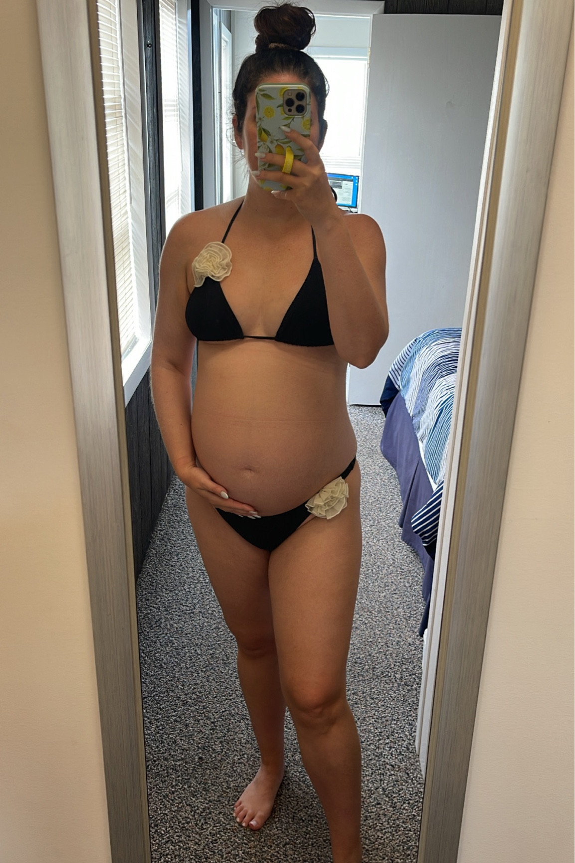 Bump friendly maternity swimsuit bikini, black bikini with cream rosettes, bikini triangle top, cheeky bikini bottoms

Wearing large in top, large bottoms

#LTKswim #LTKbump #LTKSeasonal