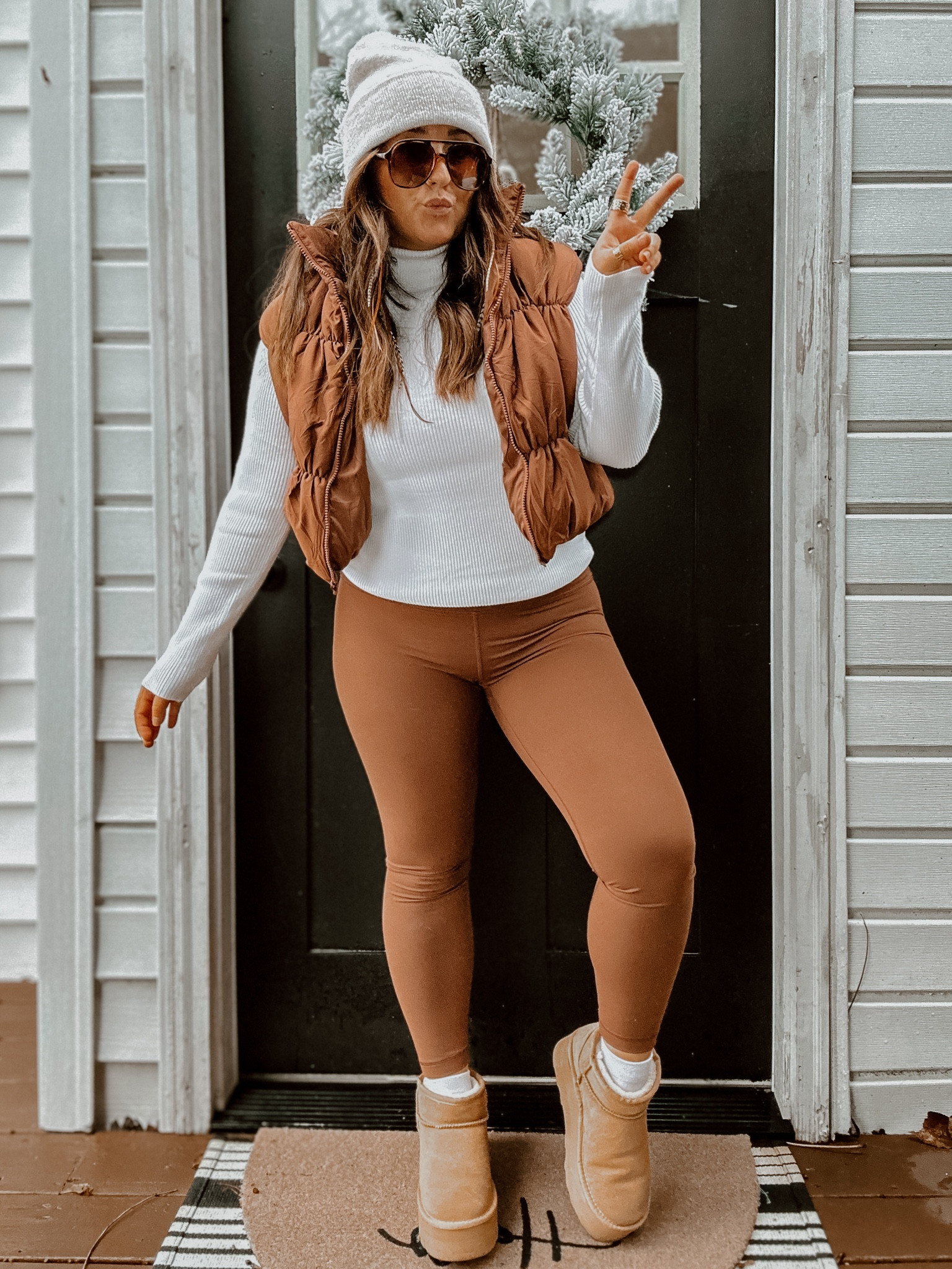 Brown and white neutral winter outfit idea. Cropped puffer outfit. Ugg mini outfit idea. Ugg mini swaps for less! Long sleeve - medium / leggings - medium / crop puffer vest - medium 

#LTKGiftGuide #LTKstyletip #LTKSeasonal