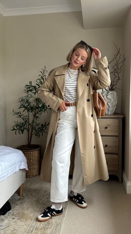 Easy and casual transitional outfit 
Jeans - cos I wear w28 
Tee - size 10
Trench - Burberry, alternatives linked 
Bag - polene cyme mini 