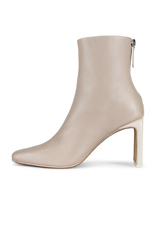 JONATHAN SIMKHAI Kelsey Square Toe Heeled Boot in Egret & Tan from Revolve.com | Revolve Clothing (Global)