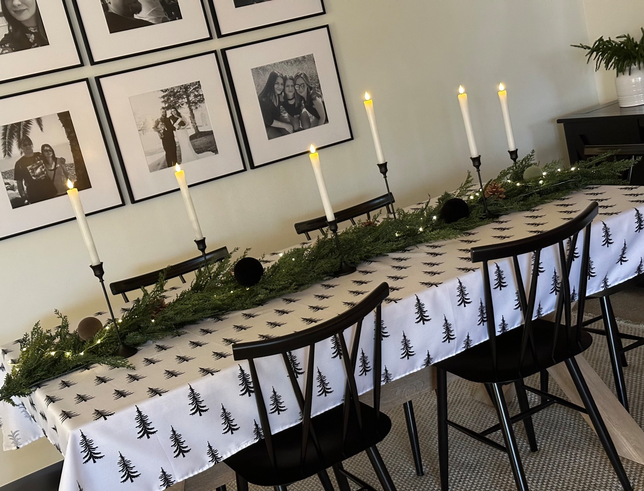 Christmas table setting, winter garland, candlesticks, Christmas table cloth, black metal chairs, gallery wall, frame it easy

#LTKHoliday #LTKHome #LTKCyberWeek