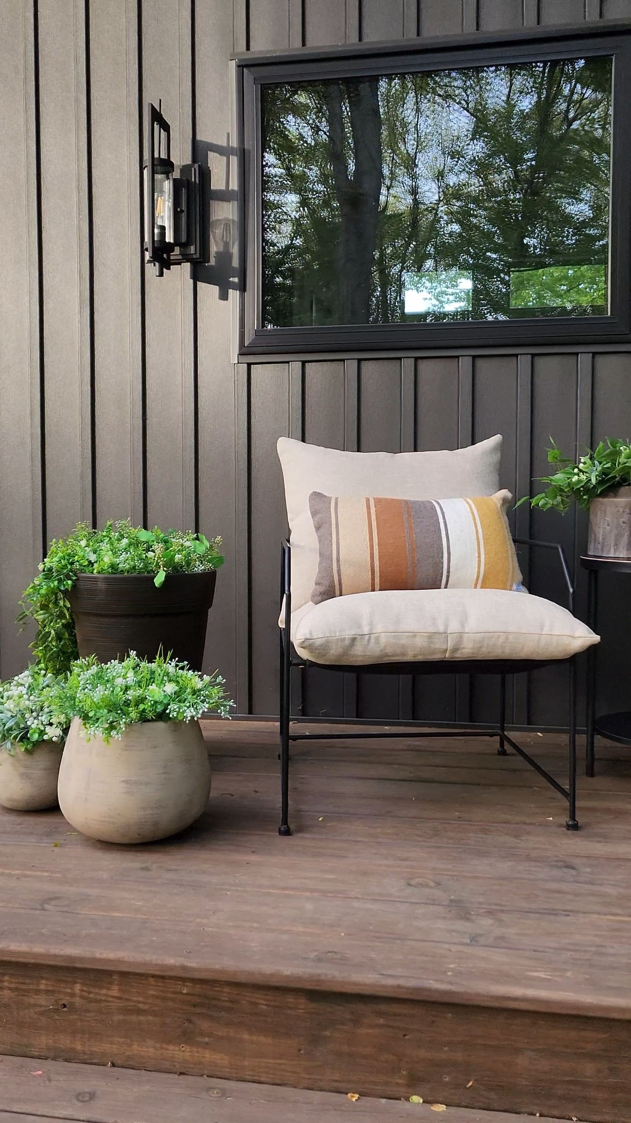 For this year's spring - summer front porch look, I used most of the same decor from last season with a sprinkle of new additions. 

Old || Large cement planters filled with faux greenery + flowers • Striped lumbar pillows • black round transitional accent table • botanical wreath • natural modern geometric door mat • Chris Loves Julia x Loloi Humphrey layering rug

New || Contemporary metal chairs with tan cushions • Tabletop viral planters from Walmart filled with new and old artificial greenery + flowers • Vintage lanterns • (Not pictured, but ordered) Metal planter stand to display vintage lanterns

#LTKSeasonal #LTKHome