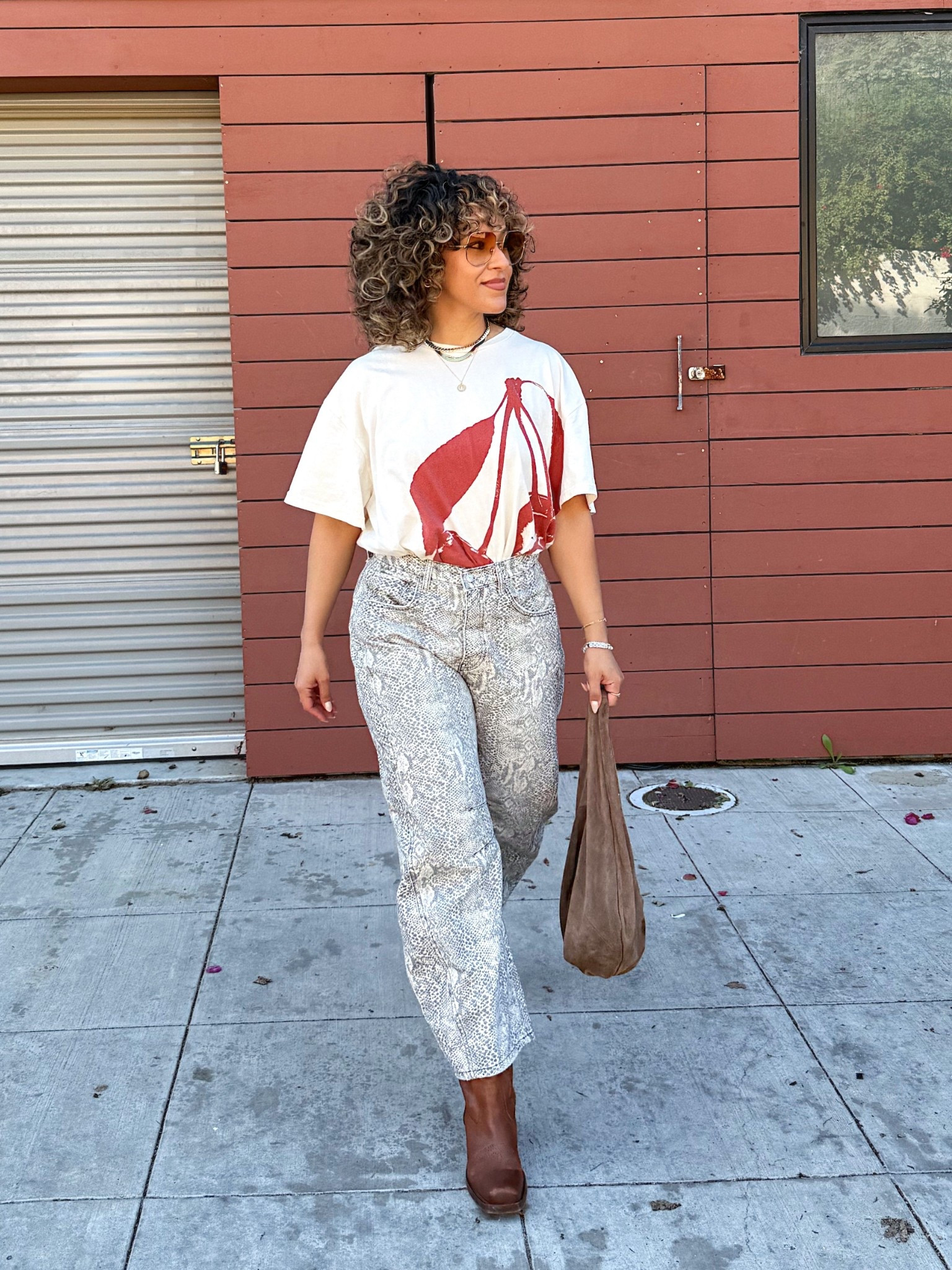 Today’s mix: leopard print jeans, a graphic tee, and cowboy boots because confidence is always the best accessory 🤎 

#LTKootd