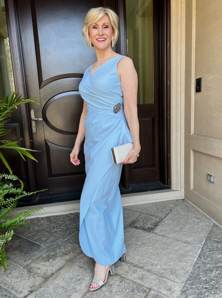 Look beautiful in blue at that wedding this summer as the mother of the bride, groom or wedding guests. This baby ble sleeveless compression gown with the wrap front is stunning!

#LTKFind #LTKSeasonal #LTKwedding