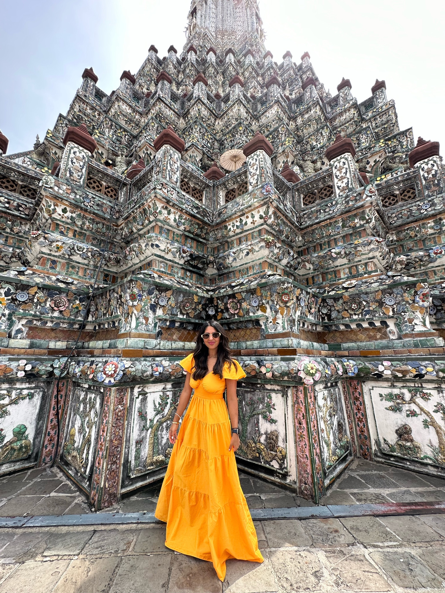 Travel outfit. Temple outfit. Asia travel outfits. Maxi dress. Orange dress. Baby shower dress. Baby sprinkle dress. Maternity dress. Long dresses. Buddhist temple outfit. Celine sunglasses dupe. Designer dupe. Dress on sale. Bridal shower dress. Bachelorette party dress. Halloween outfit. Fall outfit. Fall fashion. Fall family photos. 

#LTKtravel #LTKsalealert #LTKstyletip