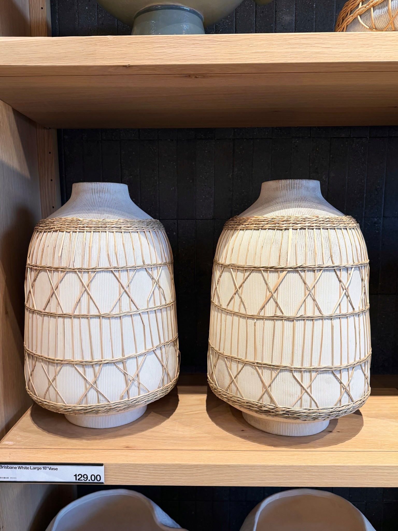 New at Crate & Barrel! 🫶🏻 The Brisbane White Ceramic Vase is such a beautiful coastal-inspired accent. Skilled artisans hand-carve slender grooves into the earthenware before glazing it in a soft sandy cream tone, then wrap it in woven seagrass for added texture and organic charm. ✨ Shown here in the 18” size, it’s watertight so it’s perfect for fresh botanicals, but it also looks stunning styled on its own. 🌿 Comes in two sizes! #CrateAndBarrel #HomeDecor #Vase

#LTKHome #LTKSaleAlert