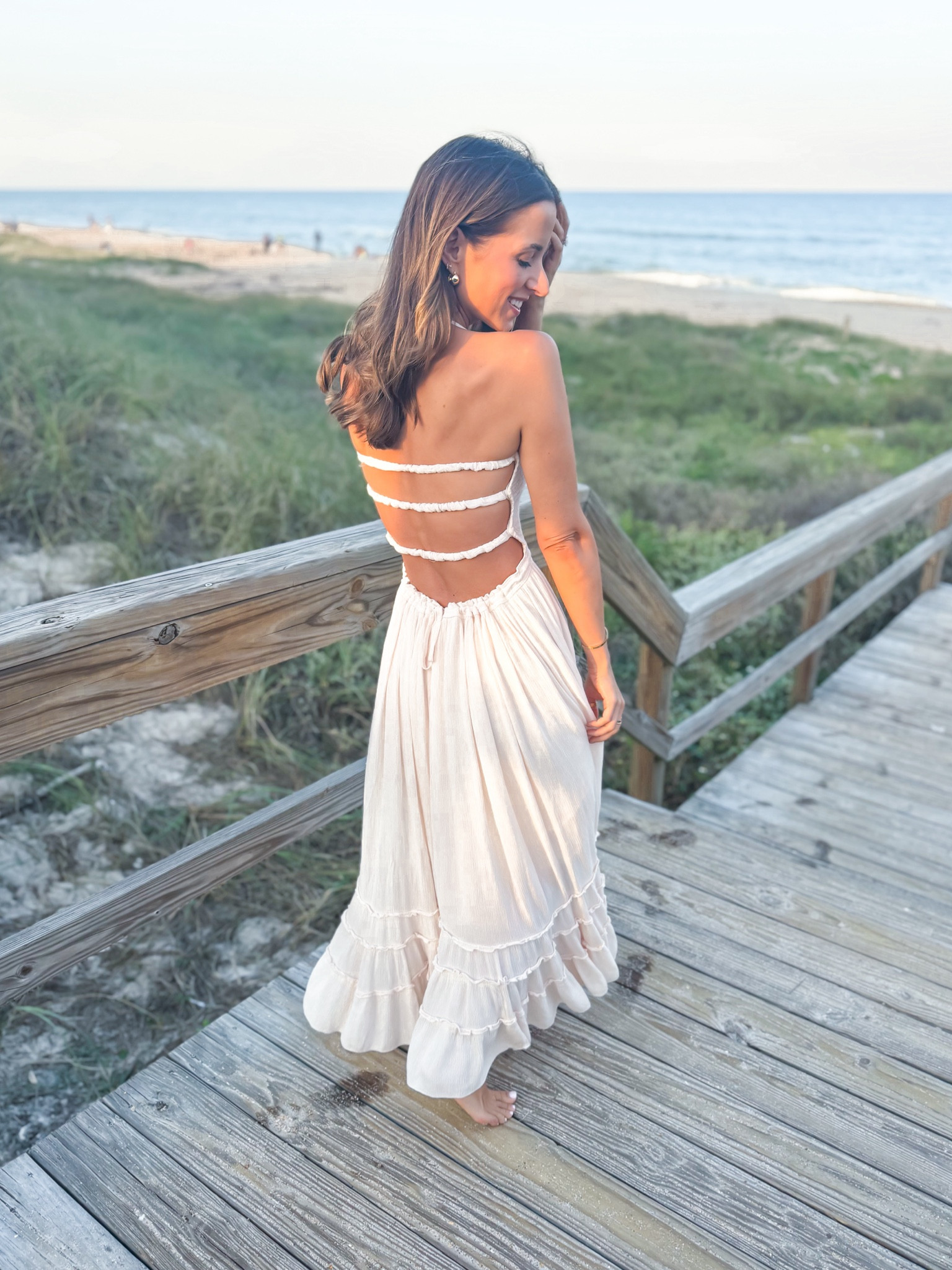 Family photo dress in small. Beach photos. Vacation dress. What I wore for our family beach photos. FP inspired dress! Runs a little big on me but you can adjust the tie around the waist and it photographs beautifully!  

#LTKSeasonal #LTKTravel #LTKFamily