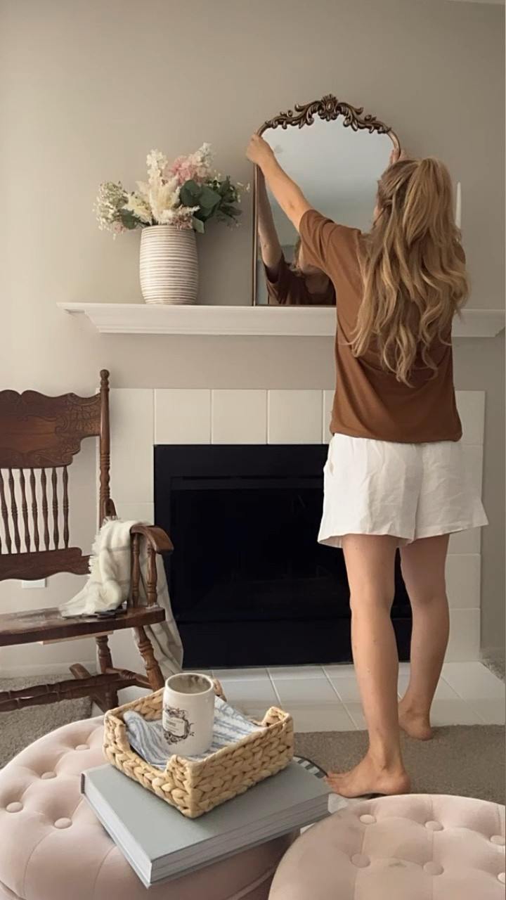 Redecorating my fireplace mantle with the stunning mirror as the focal point 

#LTKSeasonal #LTKhome #LTKxAnthro