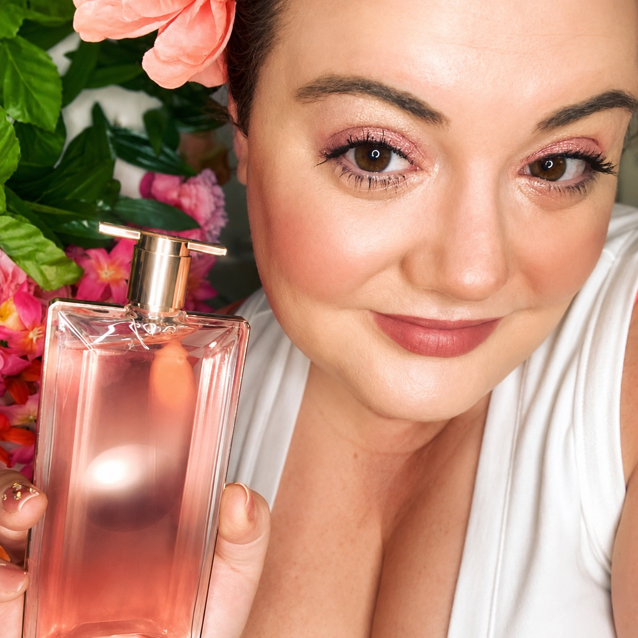 Summer vibes in a bottle. 🌺☀️🌴✨

There’s just something about a beautiful fragrance that instantly transports you somewhere warm and sunny. 

I’m loving the feminine, luminous feel of Lancôme Idôle Aura—it’s giving tropical flowers, golden sunshine, and a little everyday escape. 💕✨

A beautiful fragrance for soaking up all those summer days and dreaming of your next getaway. 🌸🌴☀️

I linked it here on LTK! 🛍️💗

#LTKBeauty #LTKselfcare #LTKstorytime