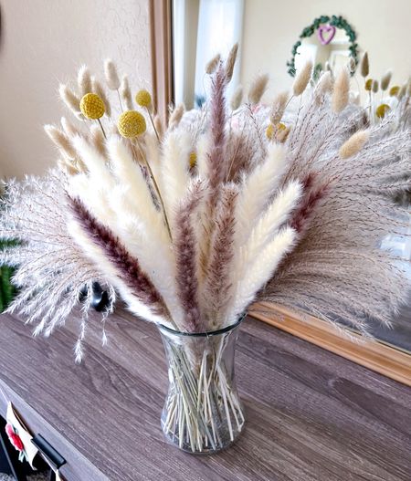 Beautiful pampas from Amazon for just under $10. I left them outside for a few hours and they got so nice and fluffy. 






100PCS Natural Dried Pampas Grass Decor - 17.5" Fluffy Pampas Grass Bouquet - Boho Home Decor Dried Flowers for Wedding Floral Room Home Party Table Decorations, amazon pampas, amazon decor, home decor, amazon finds #LTKhome #LTKwedding #LTKparties#LTKsalealert #LTKfindsunder50

#LTKSeasonal #LTKFindsUnder50 #LTKHome