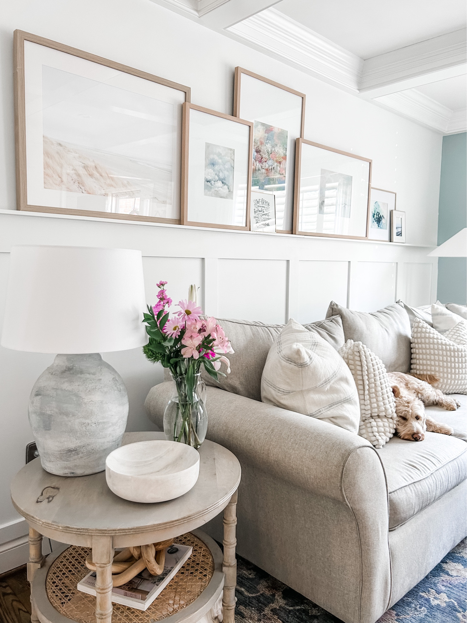 Love how our gallery wall came together with light colored wood picture frames from Target! 

Living room decor, wall art, gallery frame, natural wood frame, round side table, mango wood end table with cane shelves. Wood chain link decor, cream throw pillow with Pom poms, woven basket planter, blue area rug, floral area rug, Loloi area rug, living room decor, brass floor lamp, Amazon decor. 
Art prints, wall art, picture frame.

#livingroom #decor #homedecor

#LTKstyletip #LTKhome #LTKFind