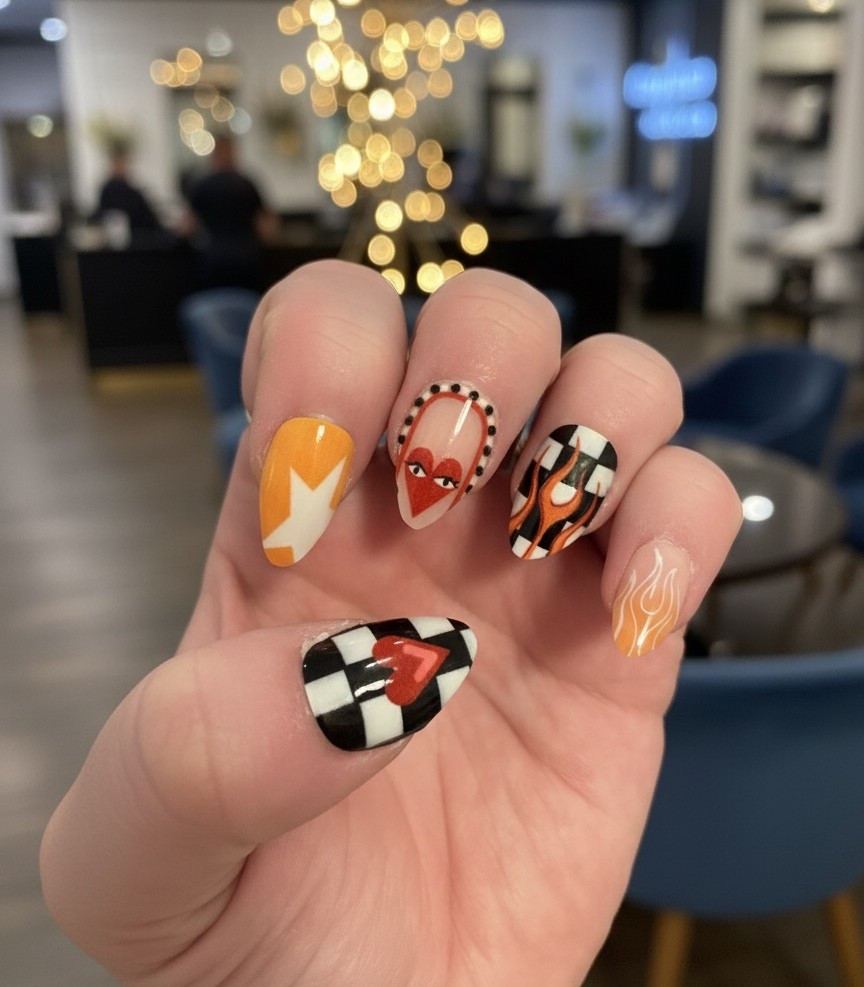 Heart eyes for these nails! 🖤🧡🏁obsessed with this mix matched set

#LTKselfcare #LTKBeauty #LTKdayinmylife
