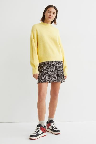 Fluffy, knit sweater. Low stand-up collar with rolled edge. Dropped shoulders, long sleeves with ... | H&M (US + CA)
