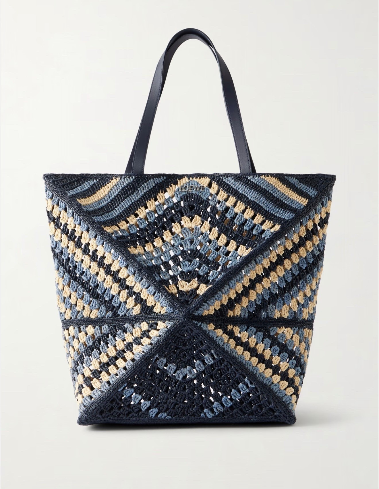 LOEWE
Paula's Ibiza Puzzle Fold large leather-trimmed raffia shoulder bag

Loewe's 'Puzzle Fold' tote can be collapsed down for easy storage when traveling, so it's ideal for vacations.

#LTKSeasonal #LTKTravel #LTKWorkwear