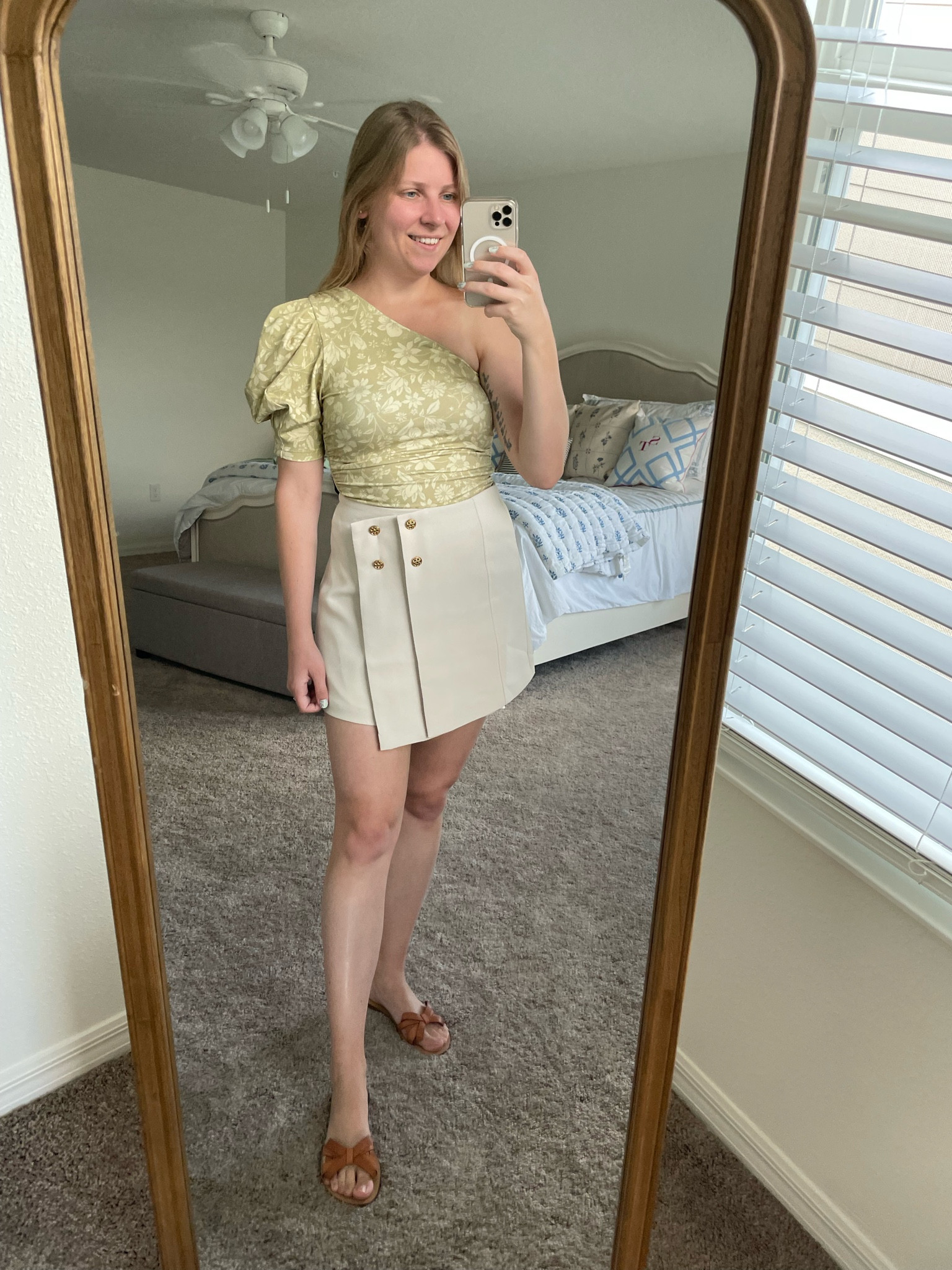 Summer to fall transition outfit. Off-white Skort, one shoulder floral bodysuit, cognac bow sandals  

#LTKSeasonal