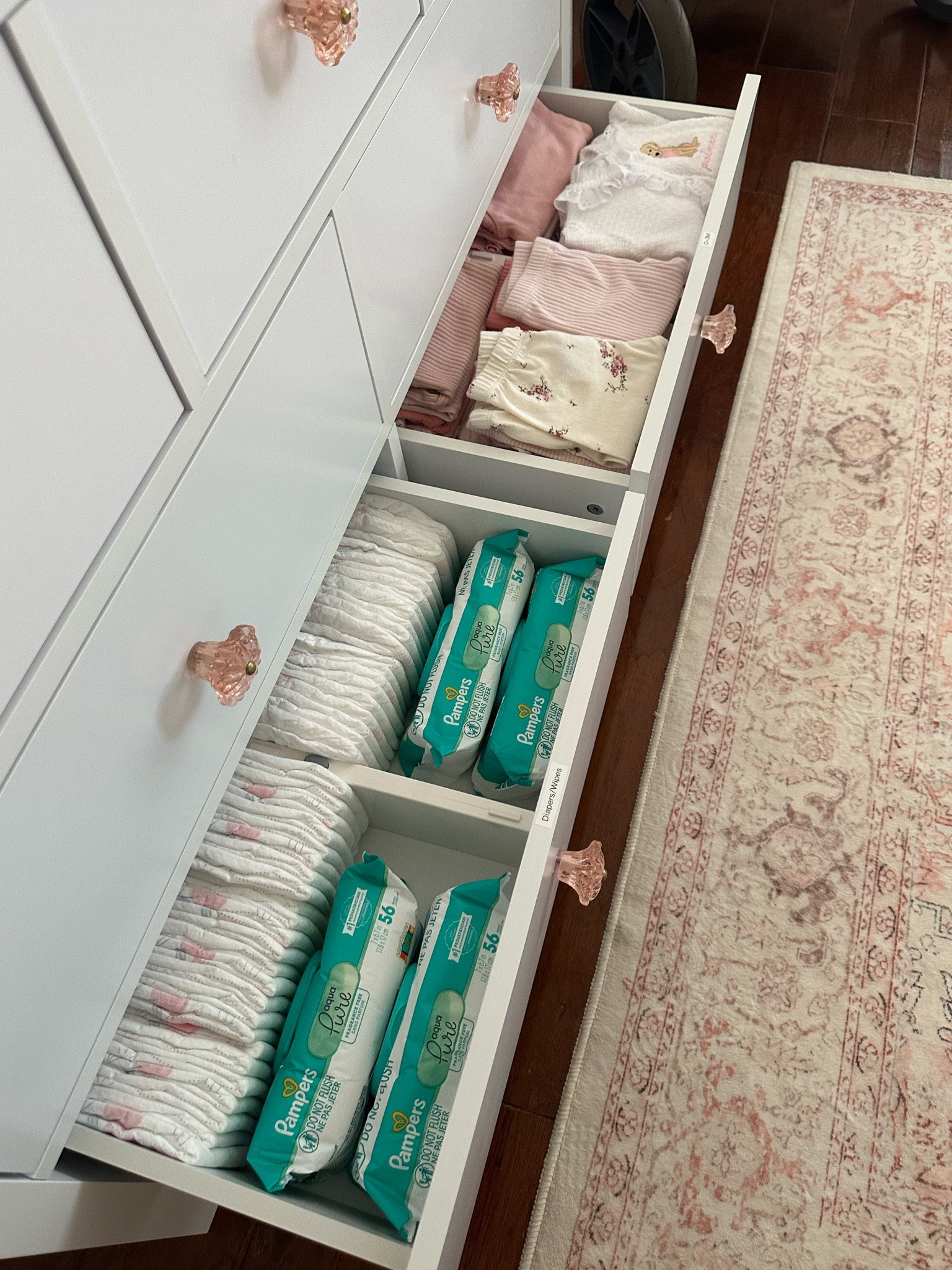 dividers + labels made organizing the changing table so easy! 