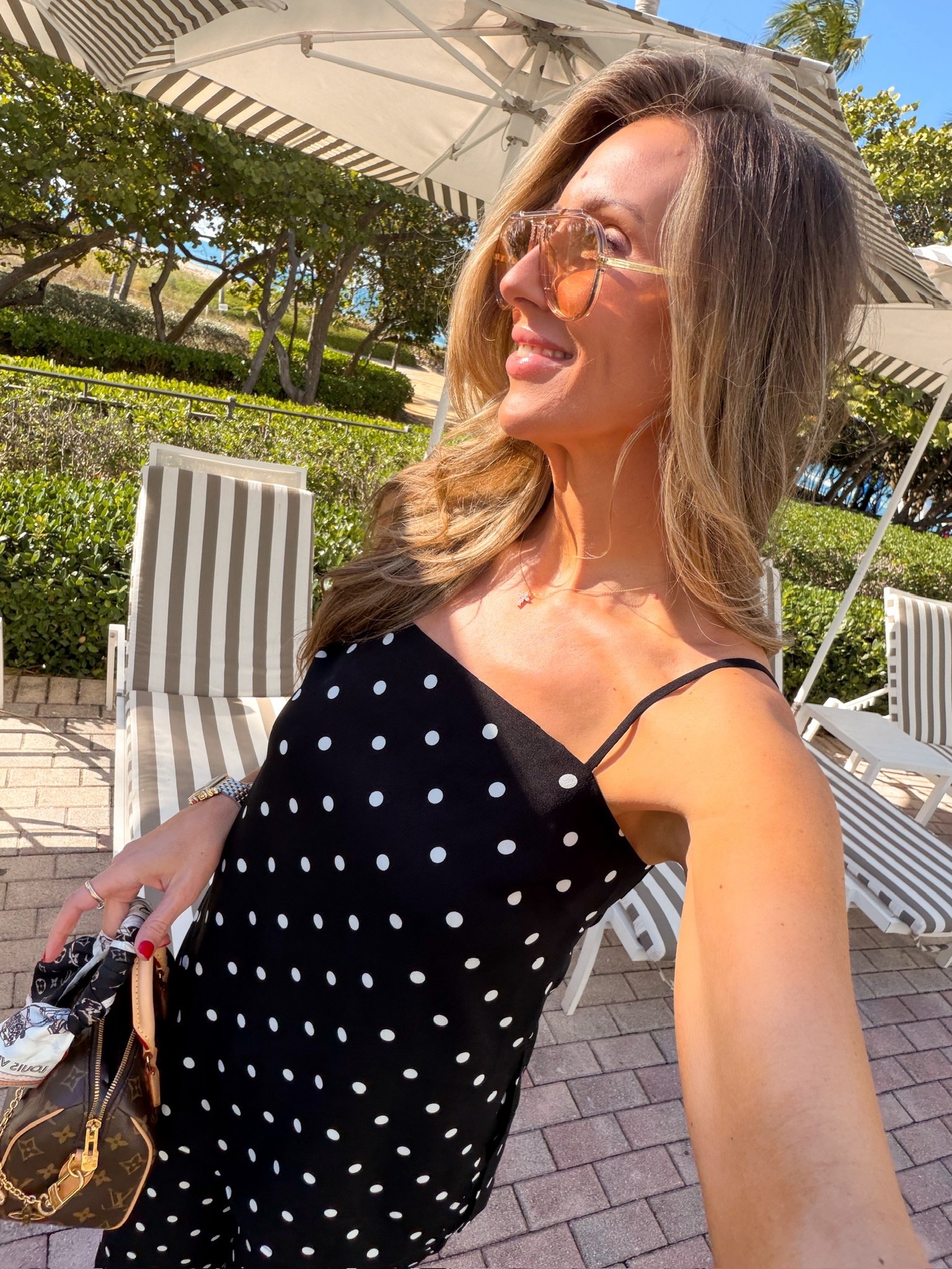 @Express polka dot outfit, spring outfit, chic vacation mom outfit, spring break, themominstylee

#LTKmomlife #LTKSeasonal #LTKootd