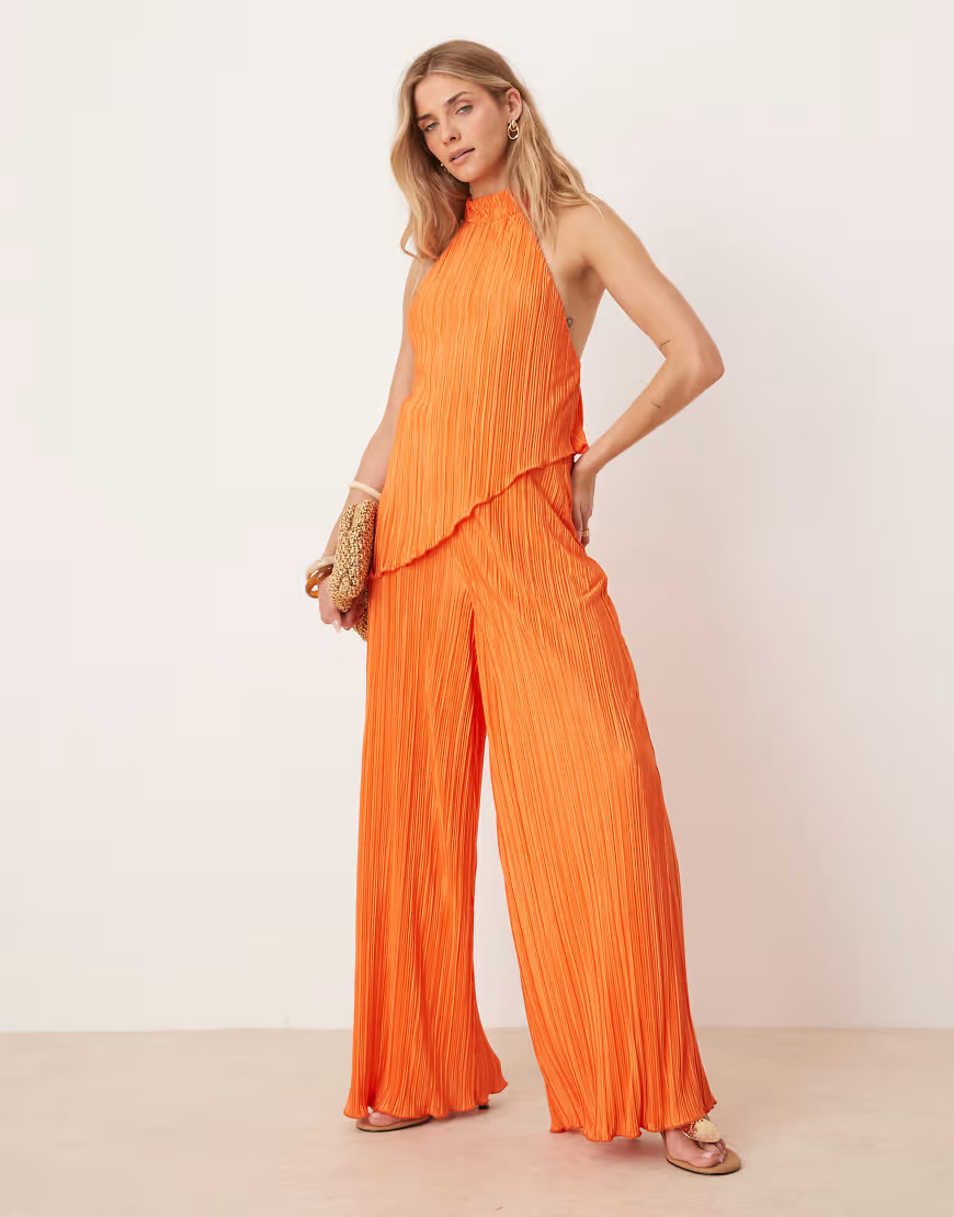 ASOS DESIGN plisse halter neck wide leg jumpsuit in orange | ASOS (Global)